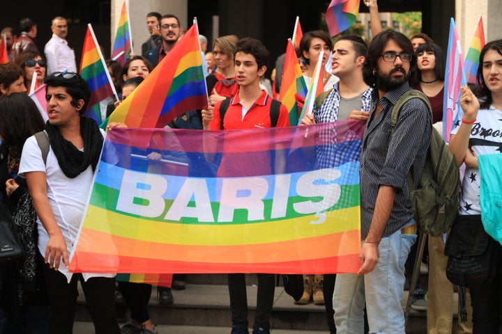 LGBTI activists from Pembe Hayat gather to celebrate outside an Ankara court.