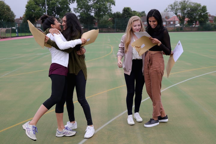 Girls from Withington Girls' School in Manchester receiving their results on Thursday 25 August 2016. 