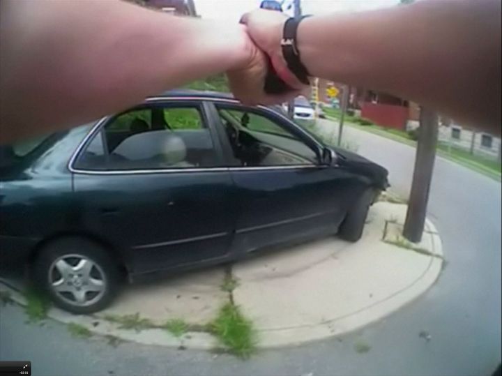 University of Cincinnati police officer Ray Tensing’s body camera shows his handgun drawn at a car that came to a stop after he shot the driver, Samuel Dubose, during a traffic stop in Cincinnati on July 19, 2015.