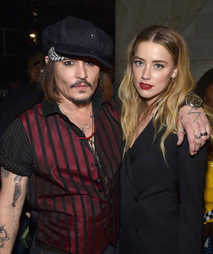 Johnny Depp and actress Amber Heard attend the 58th Grammy Awards at Staples Center on Feb. 15, 2016, in Los Angeles, California.