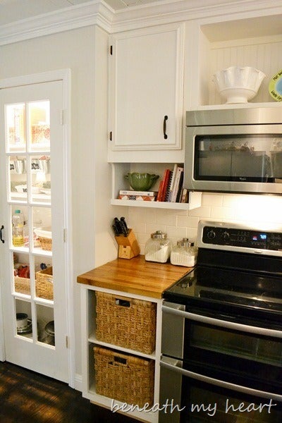 <i><a href="http://www.beneathmyheart.net/2012/04/our-diy-under-the-cabinet-cook-book-holder/?utm_source=rss&utm_medium=r