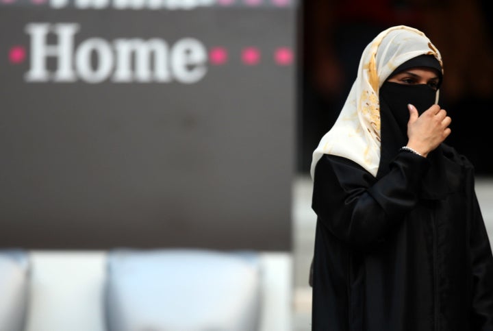 A woman wears a veil in Munich, Germany, on Aug. 5, 2008. The country's leaders have varying opinions on banning face co