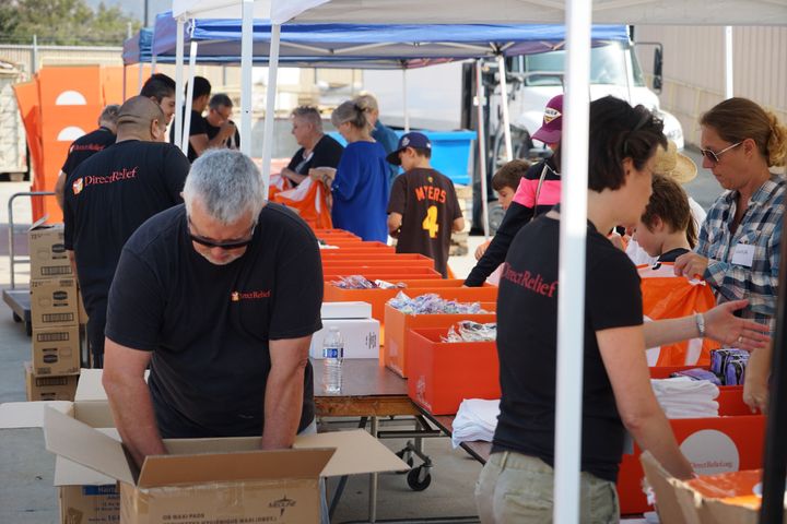 Approx. 50 Volunteers at Direct Relief at Direct Relief Headquarters in Goleta, CA. working to help displaced families in the Louisiana Floods. One thousand Emergency Family Hygiene Kits delivered this week to Louisiana from Direct Relief.