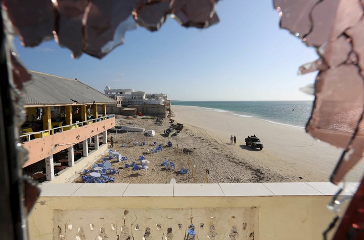 Al Shabaab militants claimed an attack on Banadir beach restaurant at Lido beach on Thursday. Pictured here, government forces patrol Lido beach following an attack at a beachside restaurant in January.