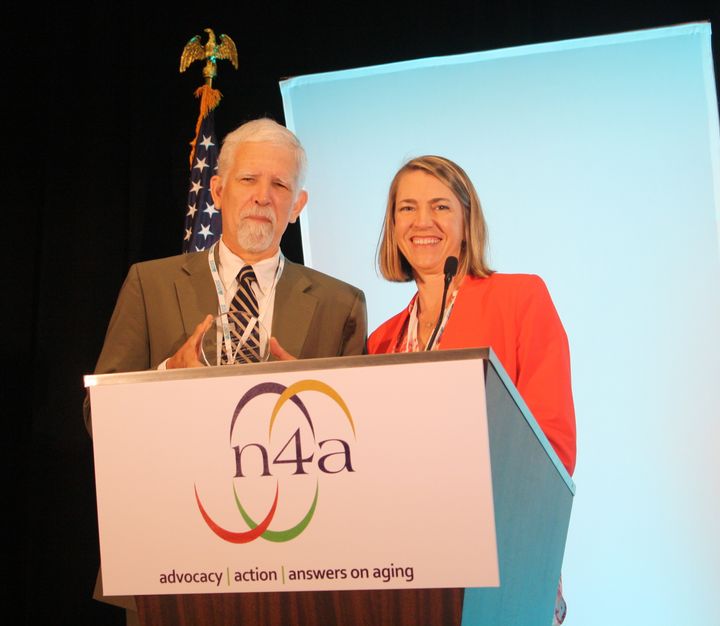 Larry Gross, ED of Southern Maine Area Agency on Aging, receives Business Innovation Award from Rani Snyder, Program Director, The John A. Hartford Foundation at n4a Annual Conferencer