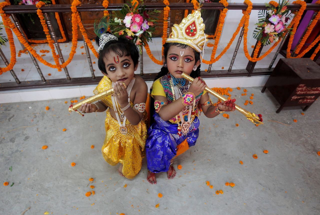 Children dressed up as Hindu Lord Krishna pose during Janmashtami festival celebrations in Agartala, India on August 24, 2016.
