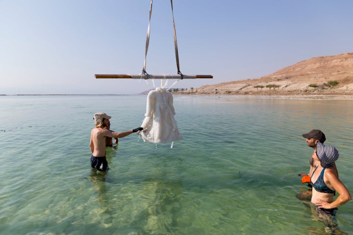 The dress emerging from underwater. 