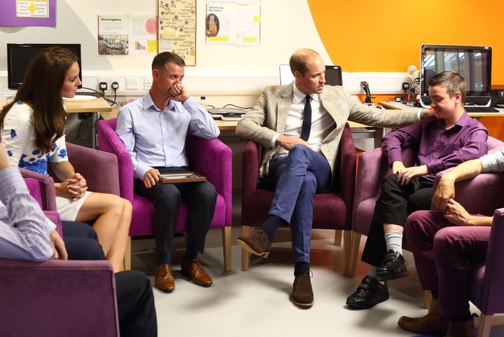Prince William, comforting 14-year-old Ben Hines. 