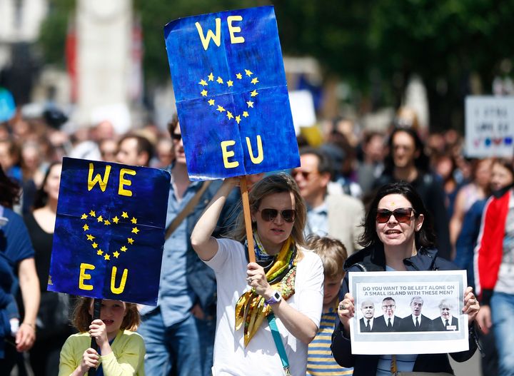 People hold banners during a 'March for Europe' demonstration against Britain's decision to leave the European Union, in central London, Britain July 2, 2016.