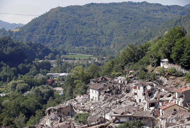 Collapsed houses are seen following an earthquake in Pescara del Tronto, central Italy, August 26, 2016.