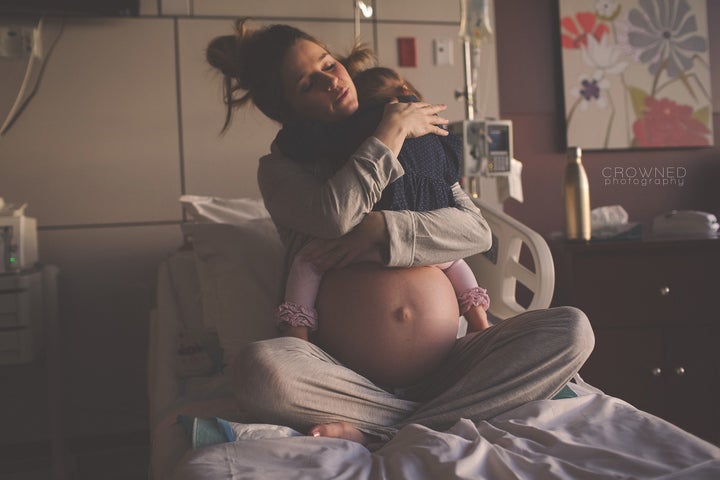 "In that moment, I took the opportunity to savor holding my littlest before I had a new ‘littlest,’” the mom said.