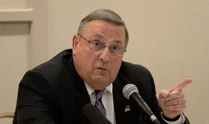 Maine Gov. Paul LePage attacked a Democratic state lawmaker on Thursday, challenging him to prove that the governor was a racist.
