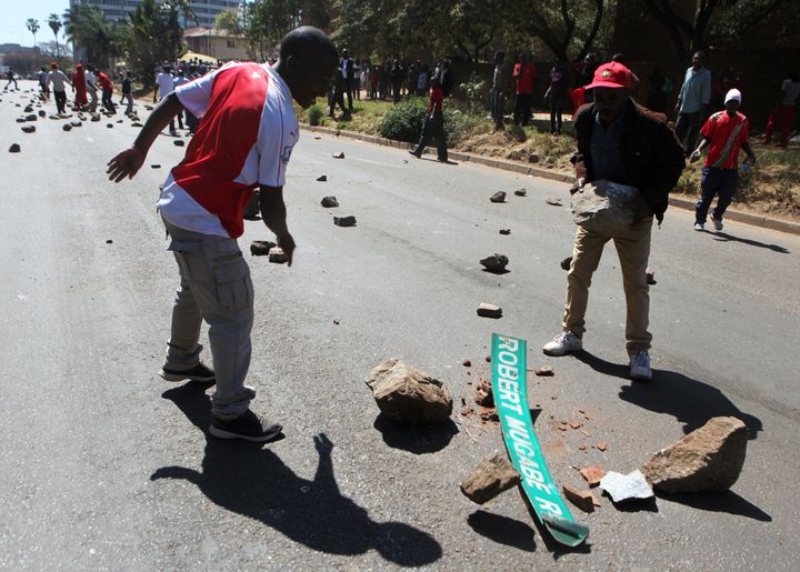 A few dozen supporters, who earlier chanted anti-Mugabe slogans, threw rocks at the police.