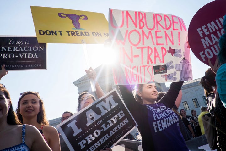 Pro-choice activists await the Supreme Court's ruling on Whole Woman's Health v. Hellerstedt on June 27, 2016.