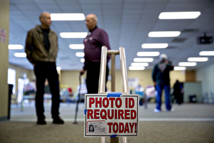 Wisconsin's voter identification law, which was enforced during the primaries, will stay on the books. Sort of.