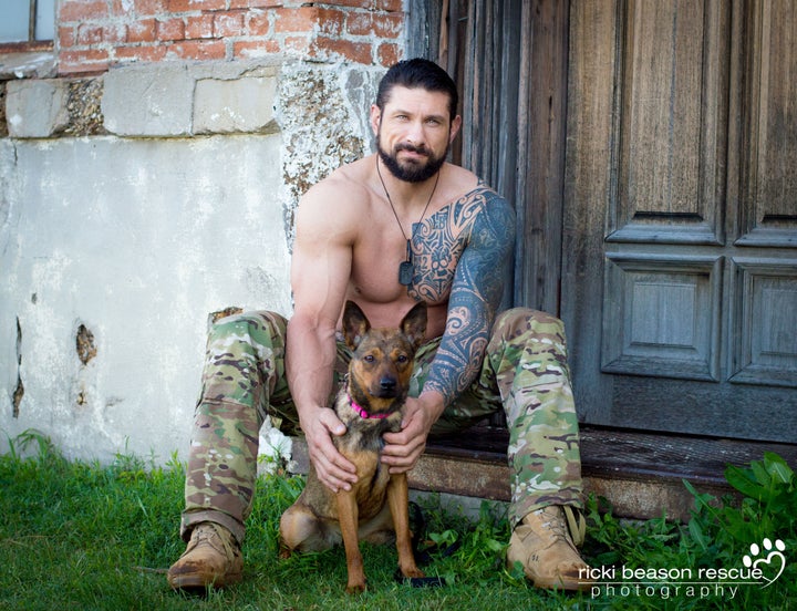 Alan, Mr. January, posing with Dakota from East Dallas Pet Rescue.