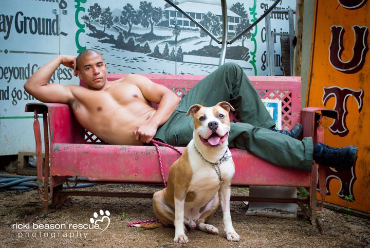 Orlando, Mr. March, posing with Mojo from Georgetown Animal Outreach. 