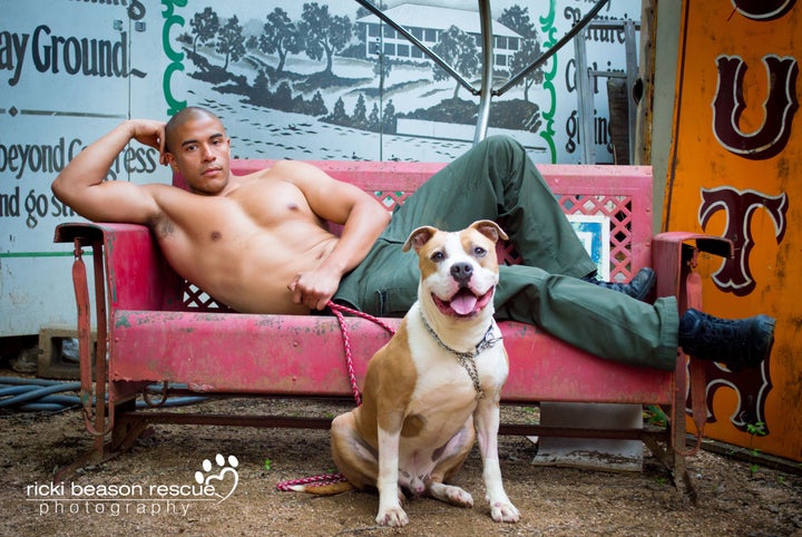 Orlando, Mr. March, posing with Mojo from Georgetown Animal Outreach.