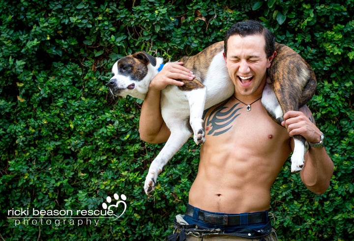 Joey, Mr. August, posing with Hoss from Gulf Coast & Southern Texas Animal Rescue.