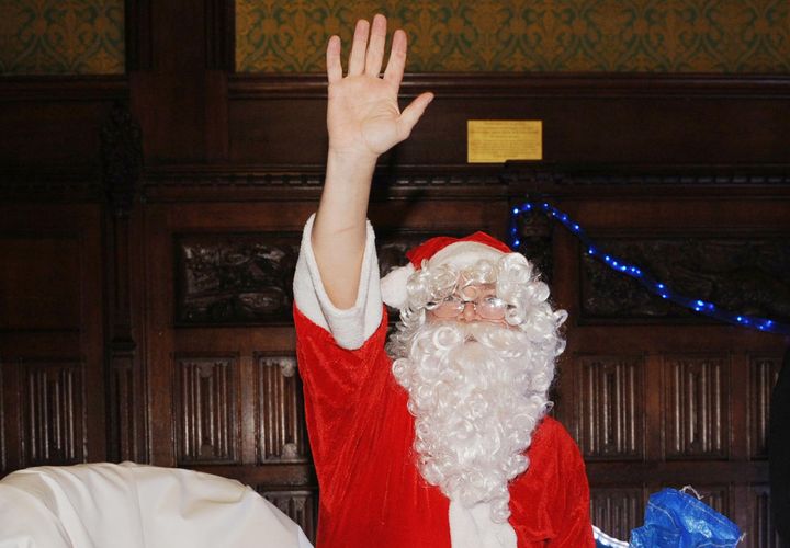 Ed Balls, pictured dressed as Santa Claus, received an unexpected Christmas call