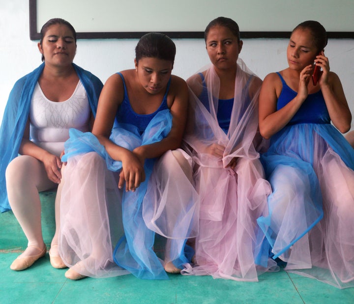 From left to right Susy 22 Itary 15 Rosaura 17 and Pati 13 wait to be called out for their first dance in Chiapas southern Mexico.