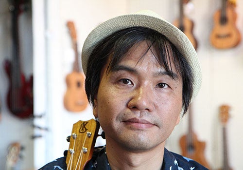 <em>Photo by Nancy A. Ruhling</em><br><strong>Masafumi plays guitar, ukulele and drums.</strong>