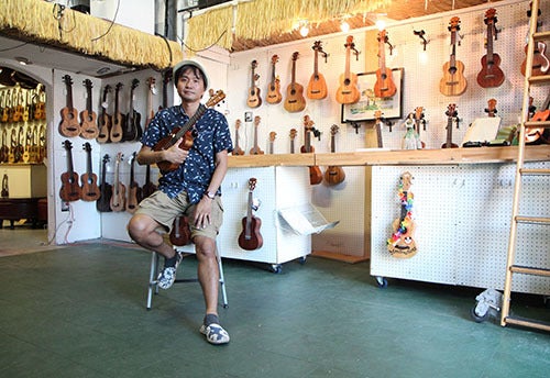 <em>Photo by Nancy A. Ruhling</em><br><strong>Masafumi has two CDs and plays lots of neighborhood gigs.</strong>