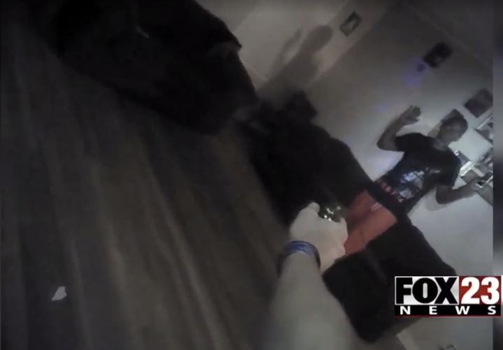 Video shows Smith's son being hit with a stun gun as he approaches officers with his hands in the air.