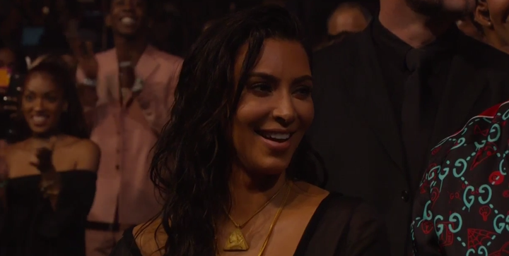 Kim proudly beamed her way through Kanye's speech