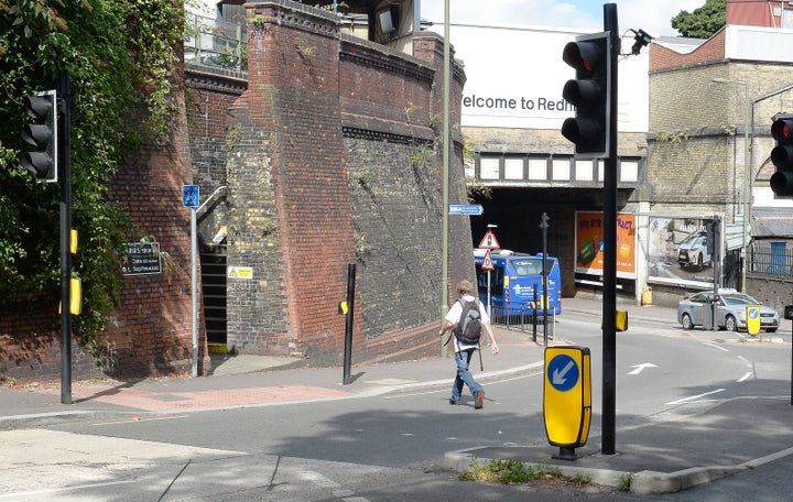 A man has been arrested after a boy was reportedly seen being pulled into a van in Redhill, Surrey. 