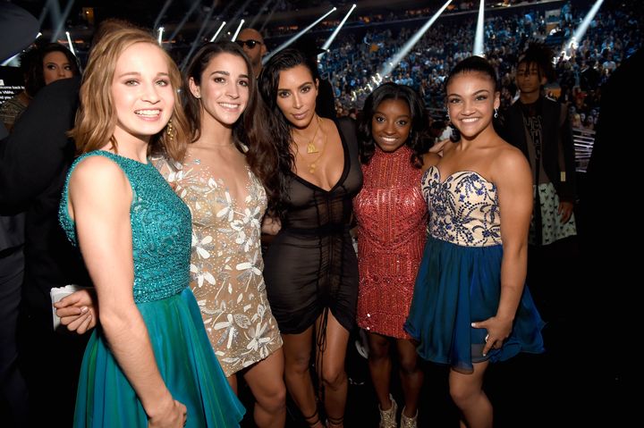 Madison Kocian, Aly Raisman, Simone Biles, and Laurie Hernandez pose with Kim Kardashian West at the 2016 MTV Video Music Awards at Madison Square Garden on Aug. 28, 2016 in New York City.