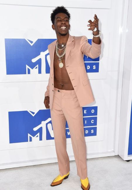 This outfit might seem crazy but, actually, it’s just further proof that pink is the menswear trend that isn’t going anywhere. That and Wiz Khalifa-inspired shirtless-ness.