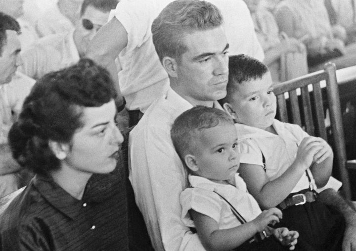 Roy Bryant, one of two men charged with the kidnapping and lynching of 14-year-old Emmett Till of Chicago, sits in court on the opening day of the trial.