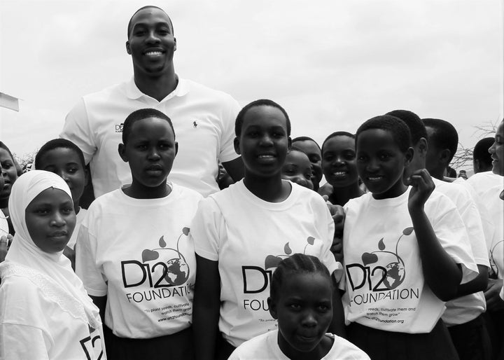 Dwight Howard along with students during the groundbreaking of Kipok Secondary School.