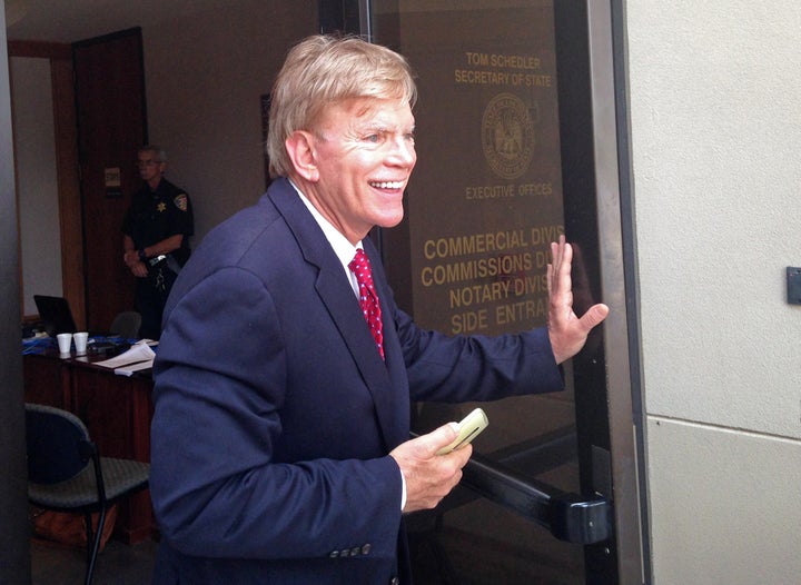 David Duke leaves the Louisiana secretary of state's office after filing to run as a Republican for United States Senate in Baton Rouge on July 22.