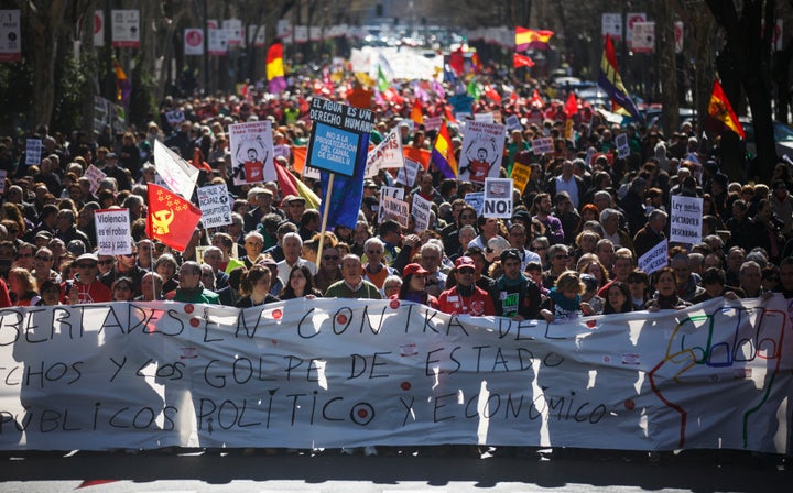 Protesters march against government austerity measures in Madrid last year.