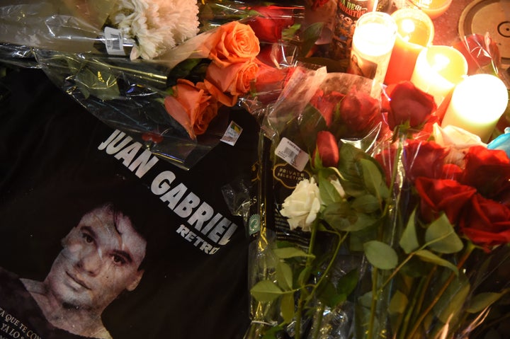 Fans mourned Juan Gabriel with flowers at the Hollywood Walk of Fame on Monday. 