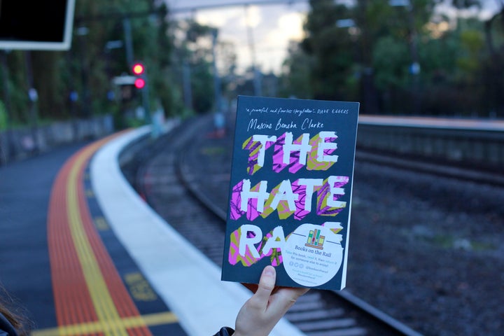 A book from the initiative with the Books On The Rail sticker on the cover.