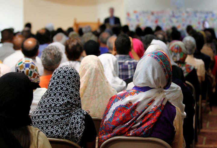 Louisville community members come together for an interfaith service to honor Muhammad Ali at The Louisville Islamic Center. June 5, 2016.