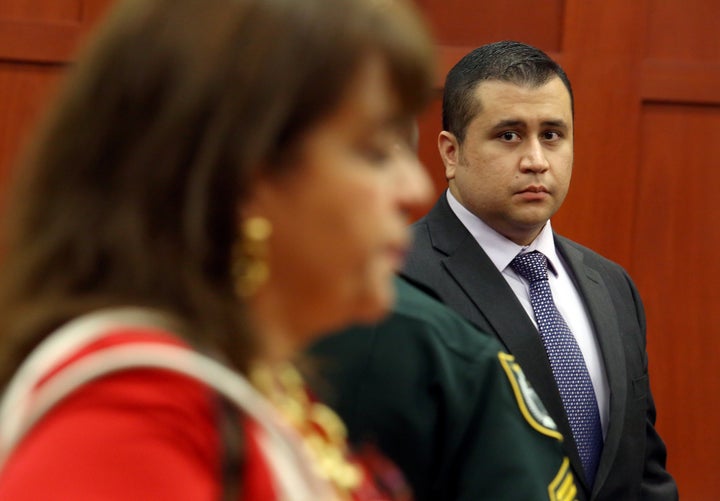 George Zimmerman glances at State Attorney Angela Corey during the start of the lunch recess during George Zimmerman trial in