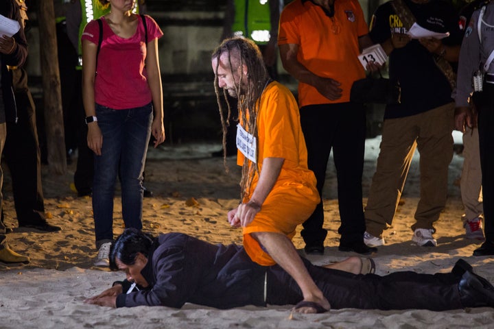 <strong>Taylor is alleged to have beaten the victim repeatedly with a broken bottle, leaving him face down and unconscious in the sand </strong>