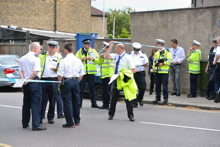 Police at the scene in Lennard Road, Penge in in south-east London.