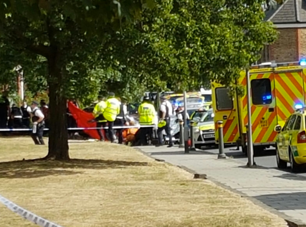 Police attend the scene of the crash in Penge