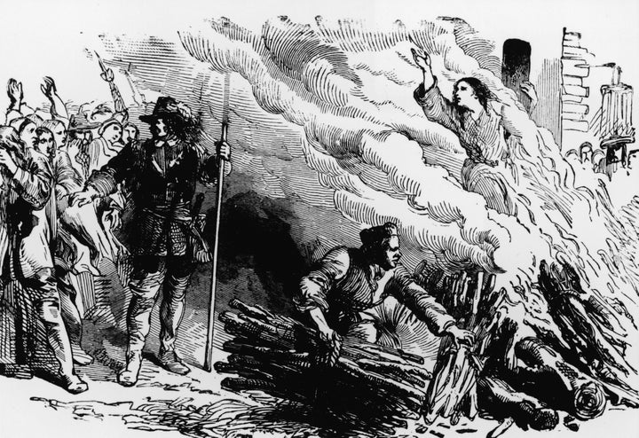 <strong>An illustration depicts a woman being burned at the stake for the crime of engaging in witchcraft, circa 1692.</strong>