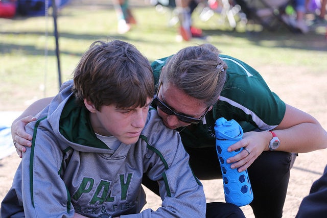 Consoling a young boy