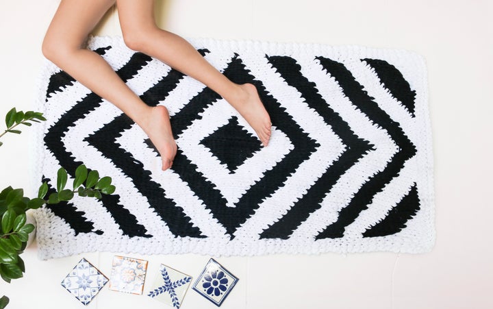 <a href="http://www.weareknitters.com/knitting-kits/decoration/antwerp-carpet" target="_blank">Antwerp Carpet kit, $76</a>