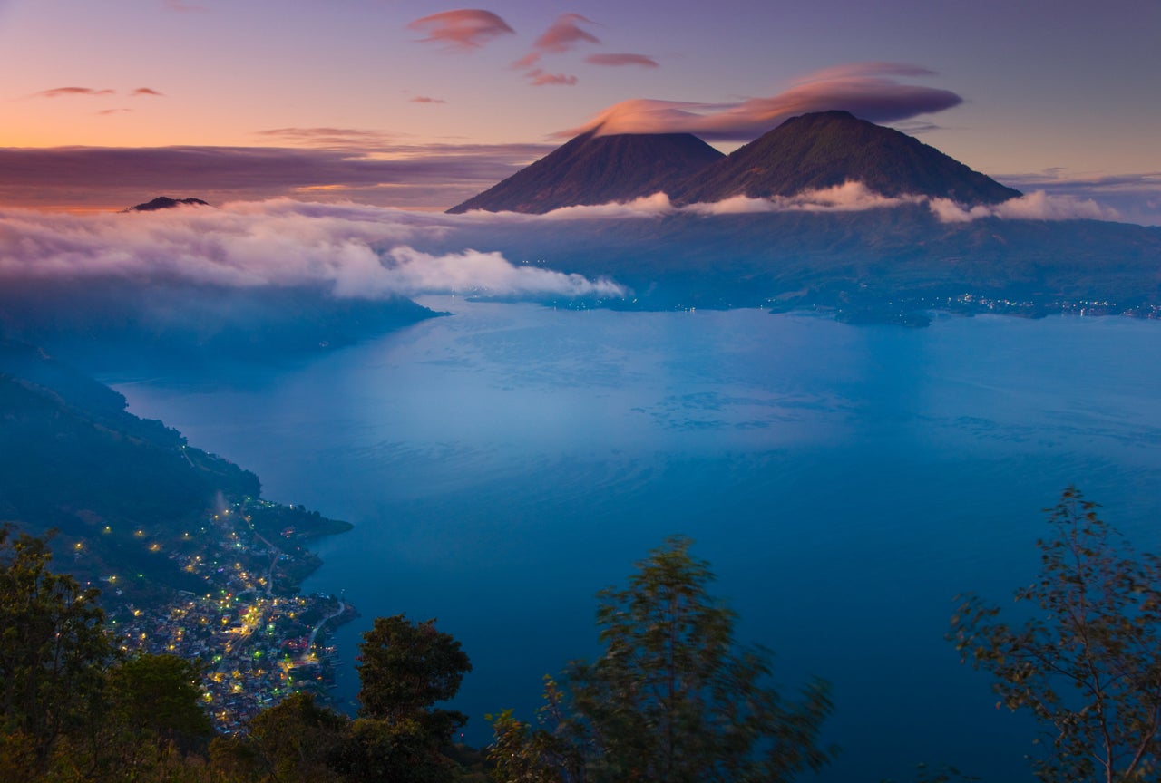 A view of Lake Atitlán at sunrise.