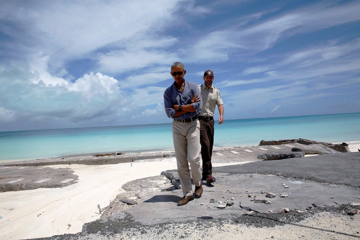 Marine National Monuments Superintendent Matt Brown, right, gives President Barack Obama at tour of Turtle Beach at the Papahanaumokuakea Marine National Monument, Midway Atoll, U.S. September 1, 2016.