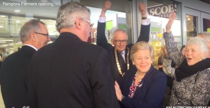Waimakariri mayor David Ayers (c) raises his arms triumphantly at the openinrg of a new department store where he purchased his first pair of new underpants in four years