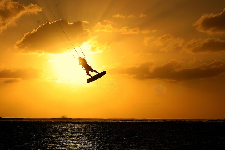 If you’ve ever wanted to try kitesurfing, Mauritius is a great place to learn.